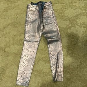 Metallic gray and pink snake Skin skinny J brand size 25